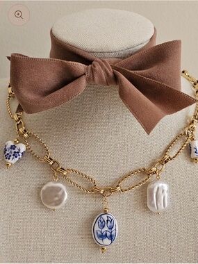 Never worn gold Chain Necklace with Blue & White Porcelain Charms